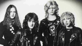 Girlschool posing for a photograph in the early 1980s