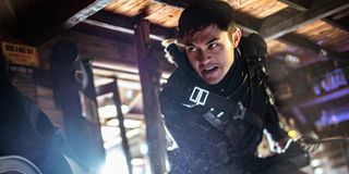 Henry Golding about to fight as Snake Eyes in Snake Eyes: G.I. Joe Origins