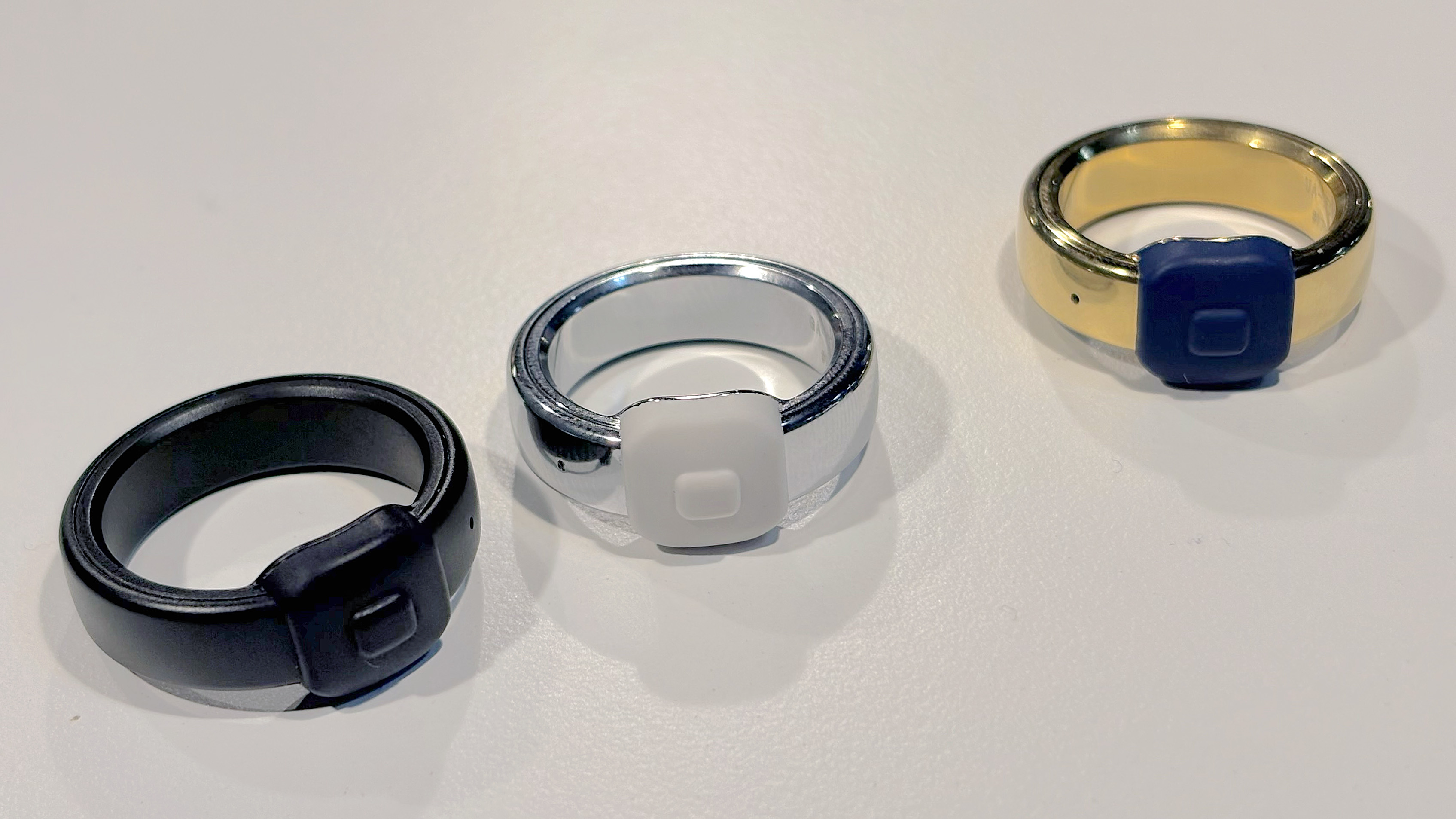 Close-up of the Pebble Index 01 smart ring in black, silver and gold at CES 2026