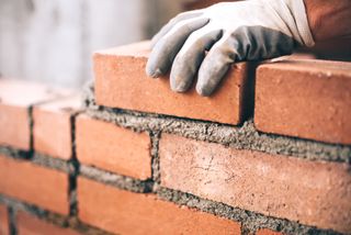 brick wall being laid