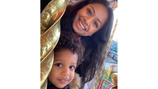 image of a mum and child on a carousel