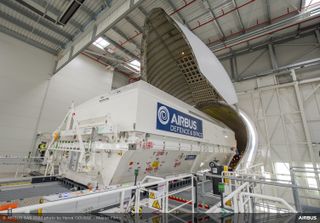 An Airbus Beluga being loaded with the Hotbird 13G satellite in Toulouse, France.