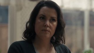 Shauna looking angry in her kitchen in Yellowjackets.