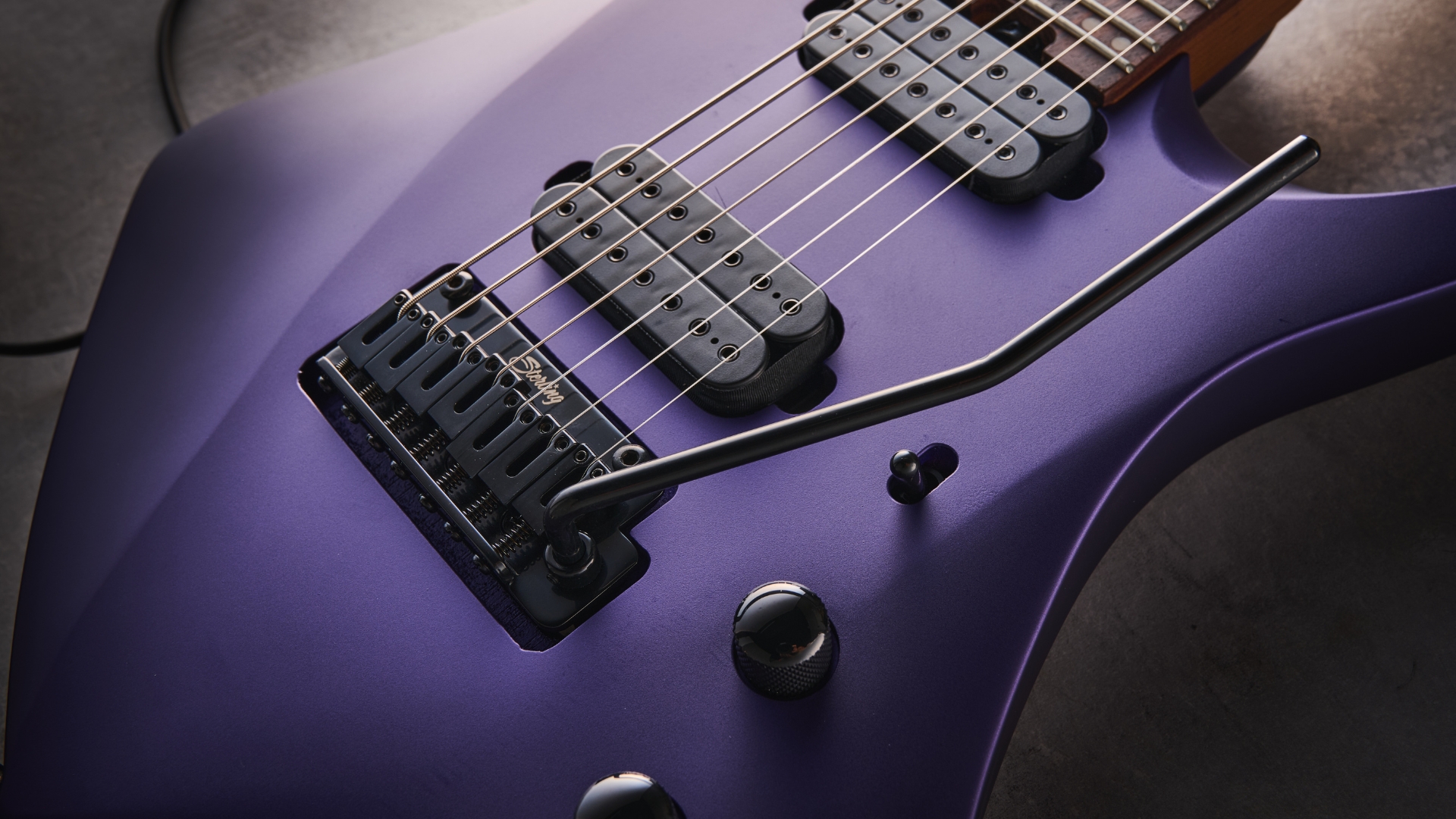 Close up of a Sterling by Music Man Kaizen 7-string electric guitar