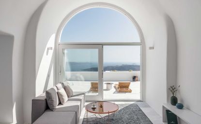 Large glass doors leading to scenic balcony