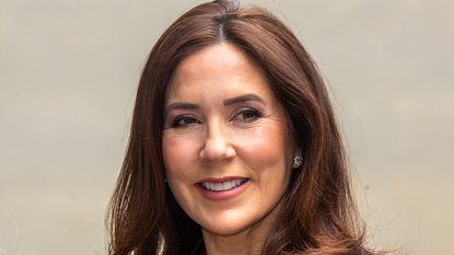 Crown Princess Mary’s crisp white shirt seen in Copenhagen. Seen here is the Crown Princess at the Womenomics on May , 2023