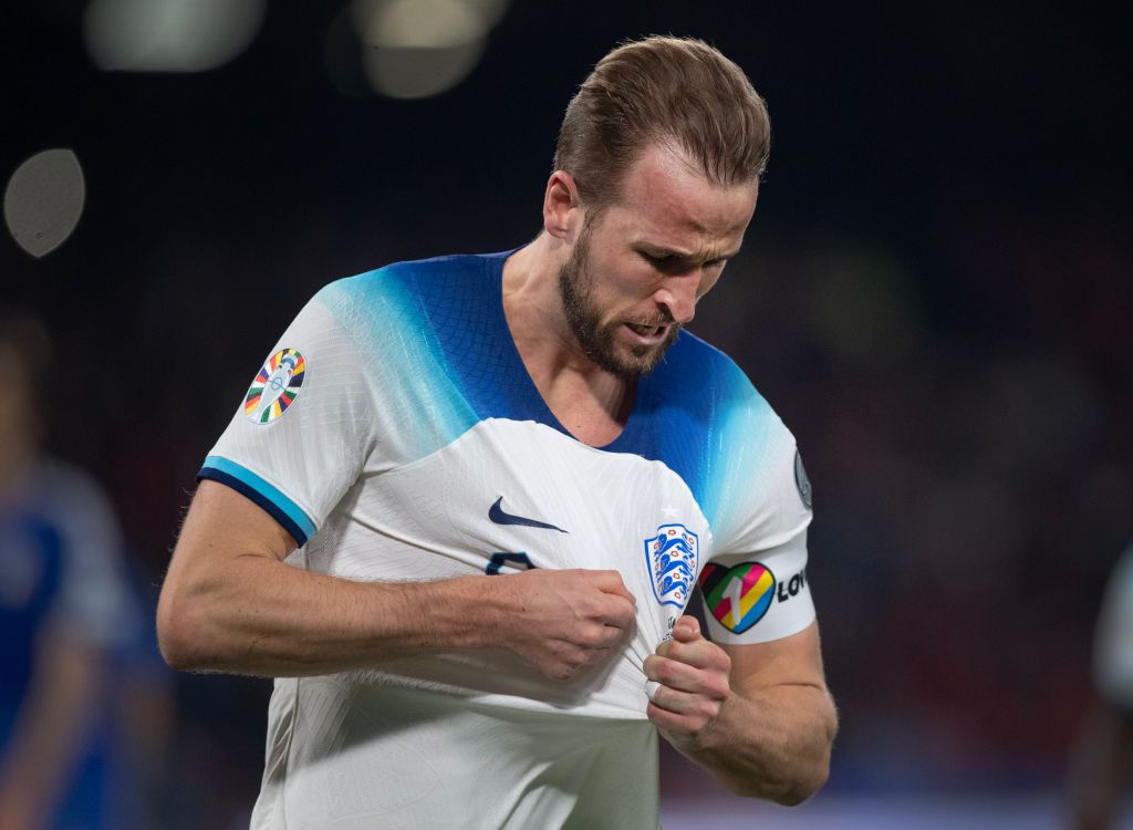 Harry Kane of England kisses the England badge after scoring the second goal and becoming England&#039;s all time record goalscorer during the UEFA EURO 2024 qualifying round group C match between Italy and England at Stadio Diego Armando Maradona on March 23, 2023 in Naples, Italy.