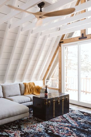 aframe cabin with white walls