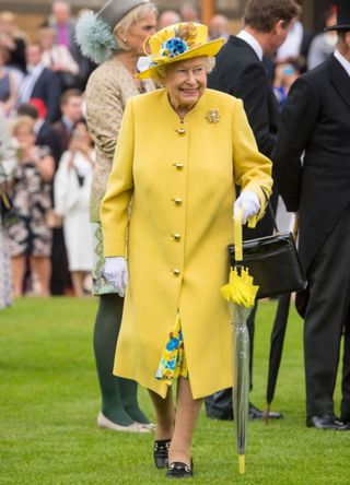 Queen Elizabeth in a yellow coat