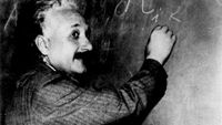 Albert Einstein at the blackboard.
