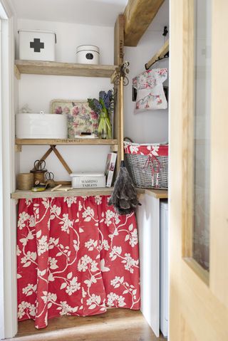Rennie cottage utility room with red curtain