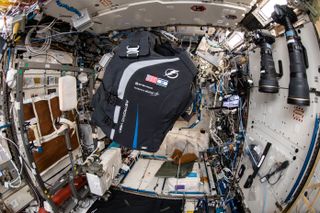 The AstroRad vest floats in the International Space Station.