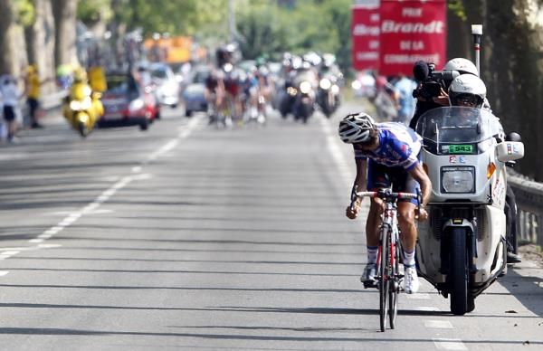 Carlos Barredo sees the rest of his breakaway companions coming.