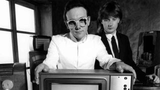 Trevor Horn and Geoff Downes of Buggles with a large television set