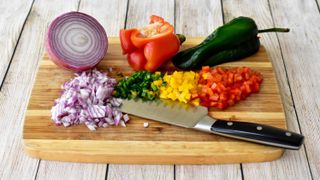 Chopped vegetables on wooden board
