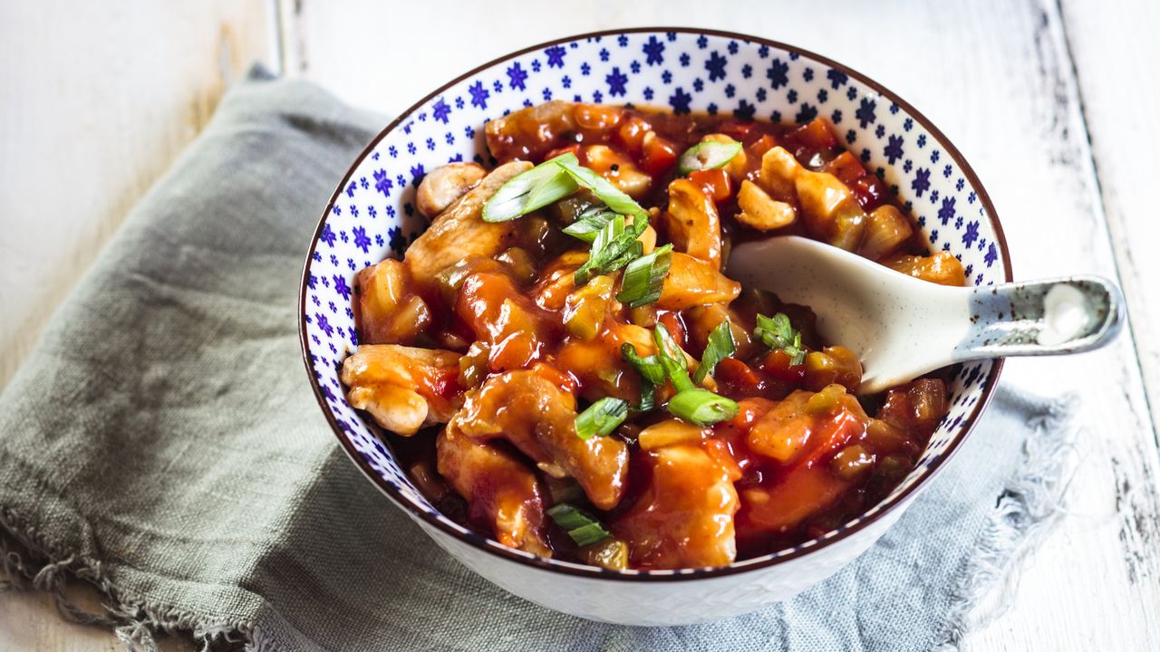 Slimming World&#039;s sweet and sour chicken in a bowl, close up