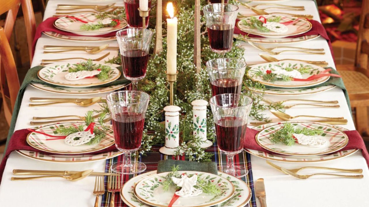 Christmas tableware with plaid runner and white tablecloth
