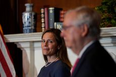 Amy Coney Barrett and Mitch McConnell
