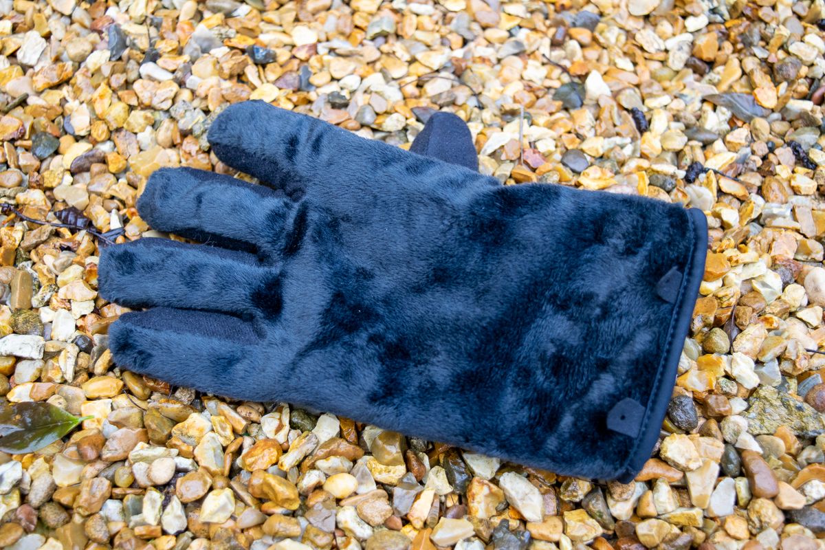 An inside out Madison DTE waterproof glove on gravel