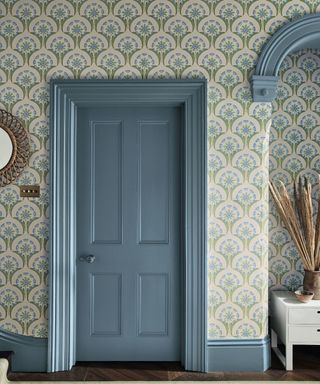 Little Greene wallpaper with blue door and skirting