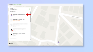 A screenshot of the icloud.com Find My Devices page, with a red arrow pointing at an iPhone.