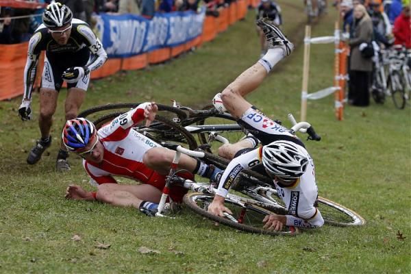 Poland's Pawel Szczepaniak and Philipp Walsleben (BKCP-Powerplus) get tangled up in Nommay.