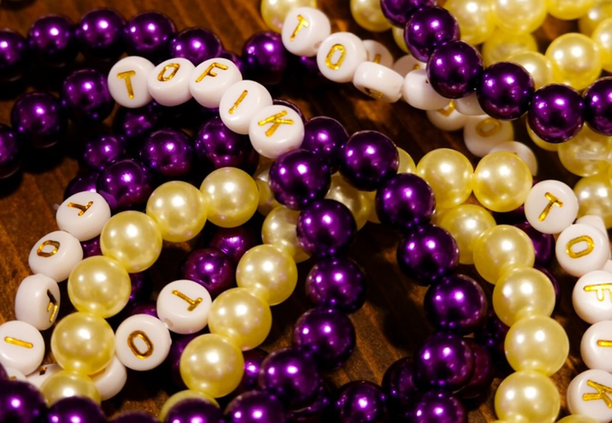 Closeup of bracelets created by CXD Trek Bikes teammates