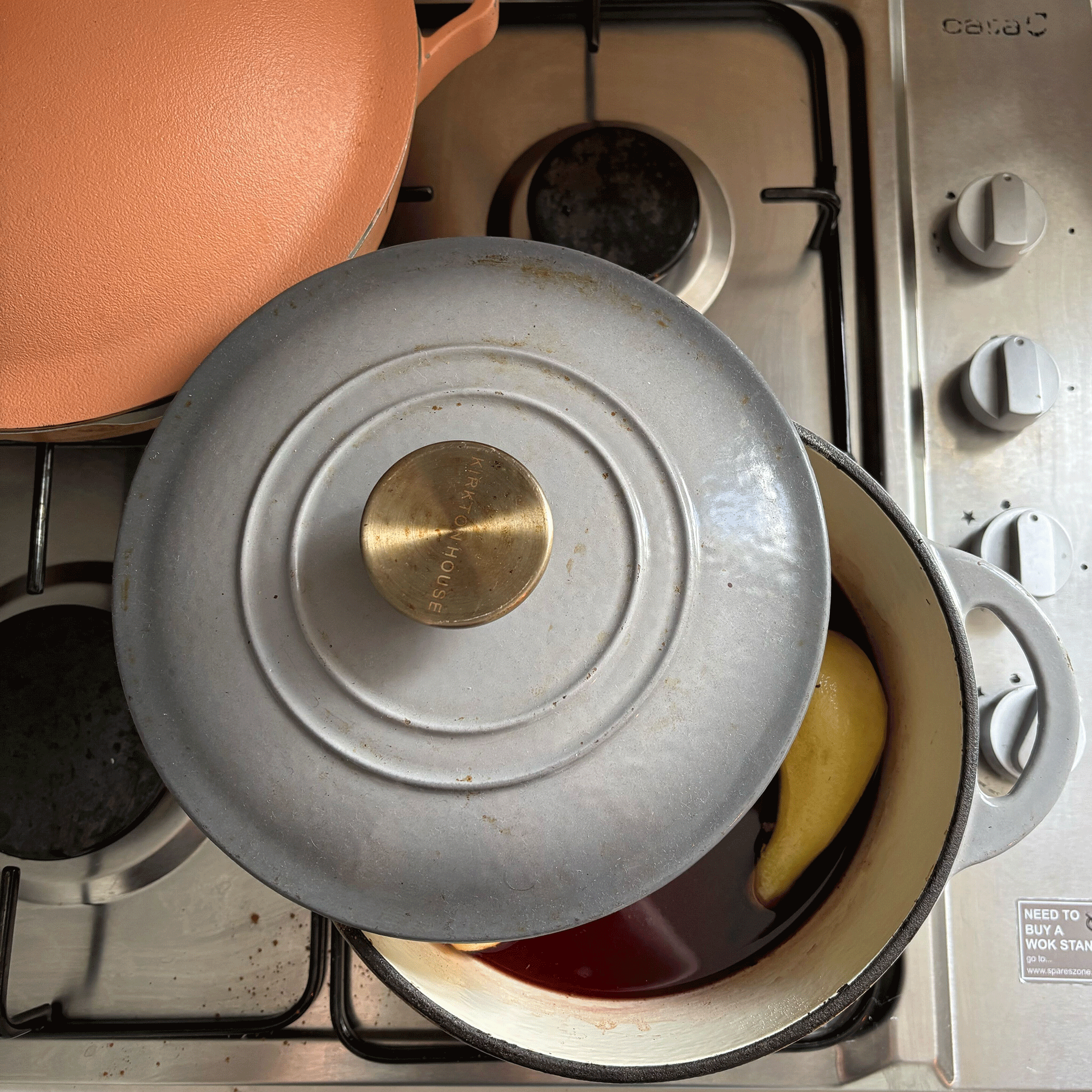 Grey Aldi cast iron dish on a hob