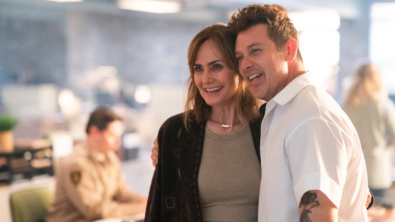 From left to right: Diane Farr and Kevin Alejandro hugging behind the scenes of Sherffi Country.