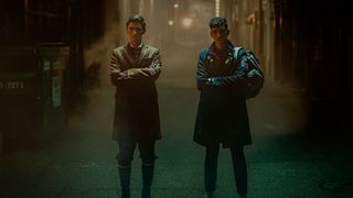 Edwin (George Rexstrew) and Charles (Jayden Revri) standing in a dark alleyway in Dead Boy Detectives episode 1