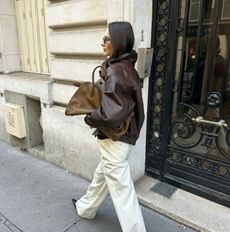 Pia Mance in a Magda Butrym leather jacket