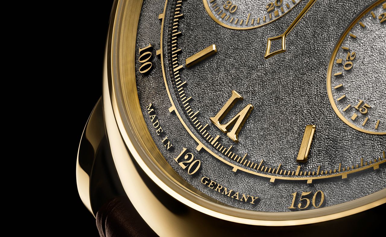 Close-up of gold and black watch, A Lange &amp; Söhne Datograph Handwerkskunst