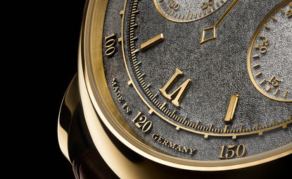 Close-up of gold and black watch, A Lange &amp; Söhne Datograph Handwerkskunst