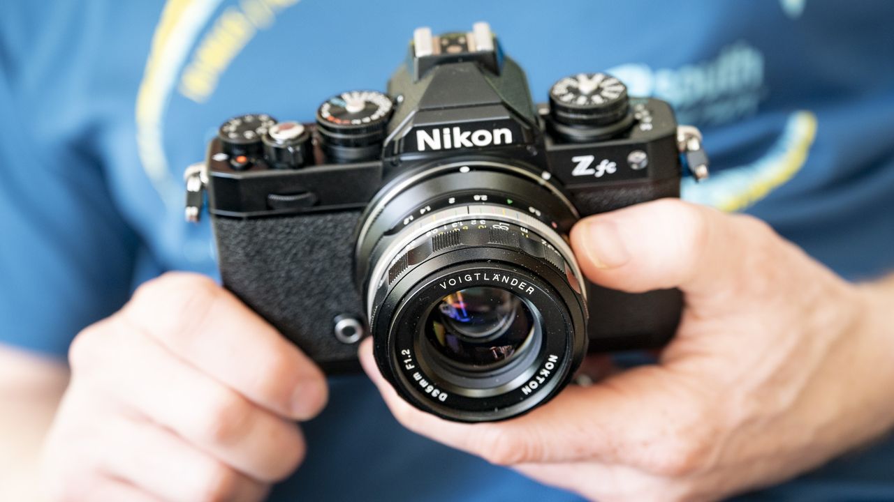 Voigtlander D 35mm f1.2 Nokton lens in the hand
