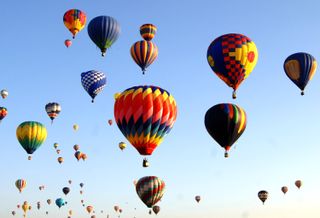 Hot air balloons in the sky during the Albuquerque International Balloon Fiesta