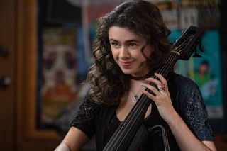 Isis Hainsworth as cellist Emily in Metal Lords.