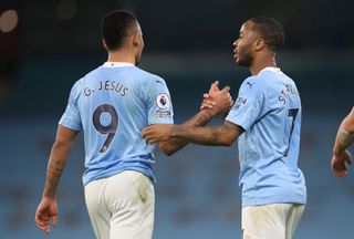 Manchester City’s Raheem Sterling (right) celebrates with Gabriel Jesus after scoring his side’s fourth goal of the game from a free-kick during the Premier League match at the Etihad Stadium, Manchester