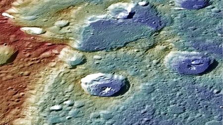 This image provides a perspective view of the center portion of Carnegie Rupes, a large tectonic landform, which cuts through Duccio crater.