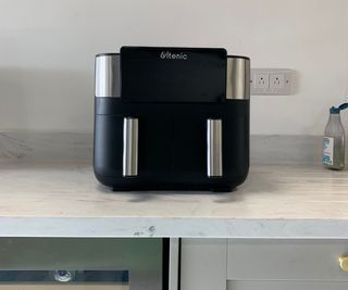 Ultenic Dual Zone Air Fryer on a kitchen counter.
