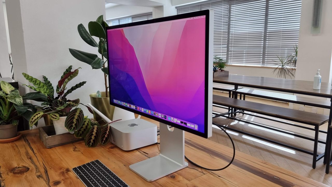 Studio Display on wooden desk