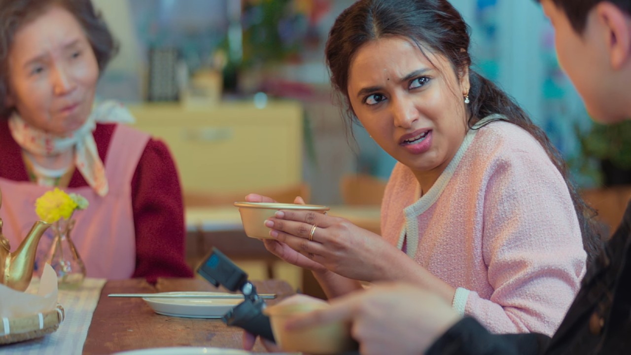 Priyanka Mohan talking to Si-hun Baek and Park Hye-jin in Made in Korea.