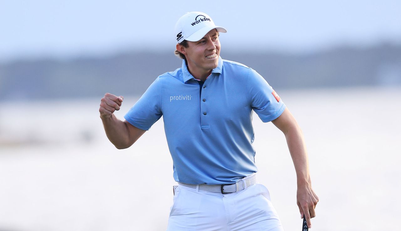 Matt Fitzpatrick fist pumps on the 18th green after winning a playoff