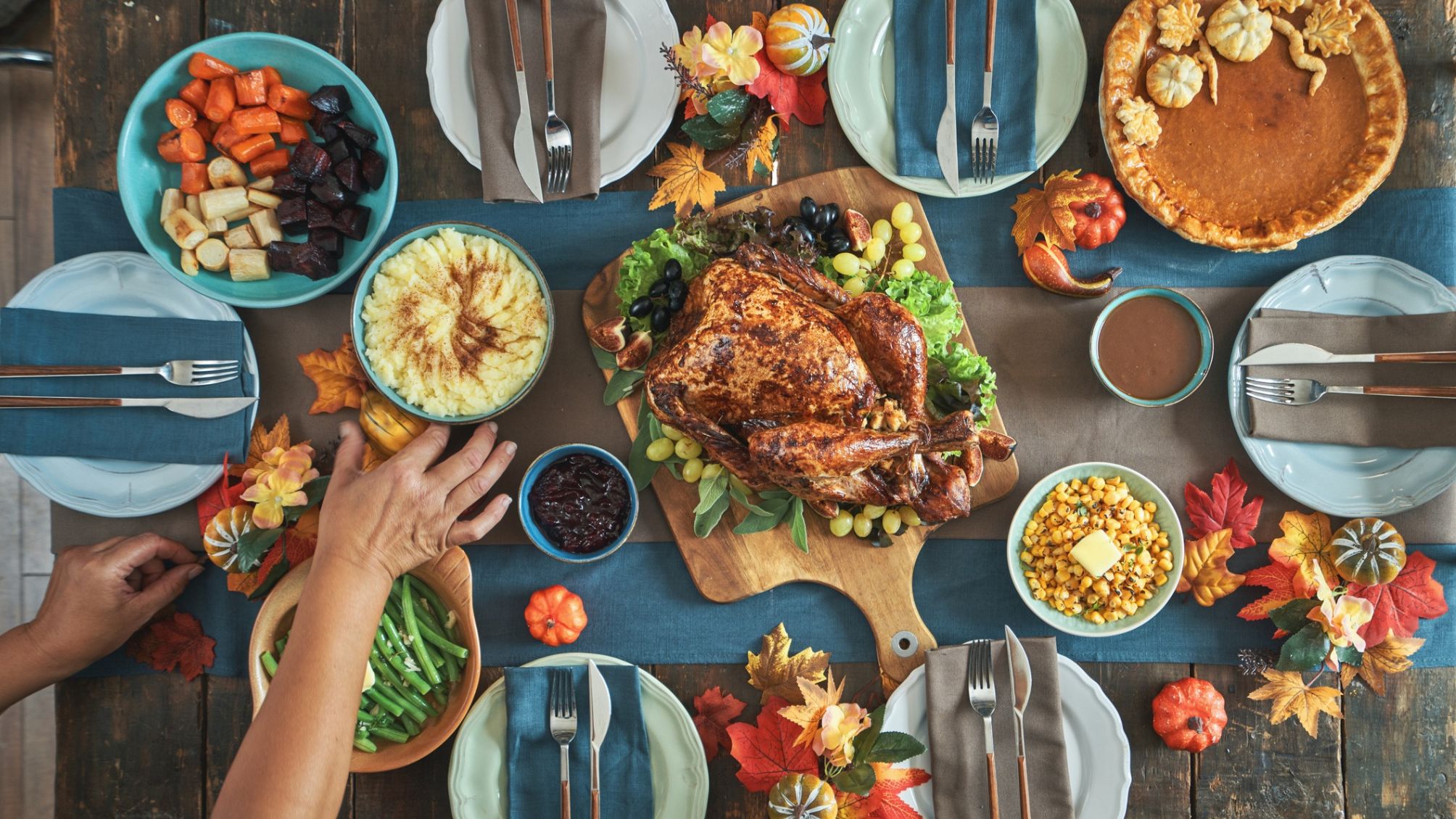Top view of Thanksgiving Holiday Dinner with Vegetables and Gravy