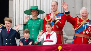 Prince George of Wales, Prince Louis of Wales, Catherine, Princess of Wales, Princess Charlotte of Wales, Prince William of Wales and King Charles III on the Buckingham Palace balcony