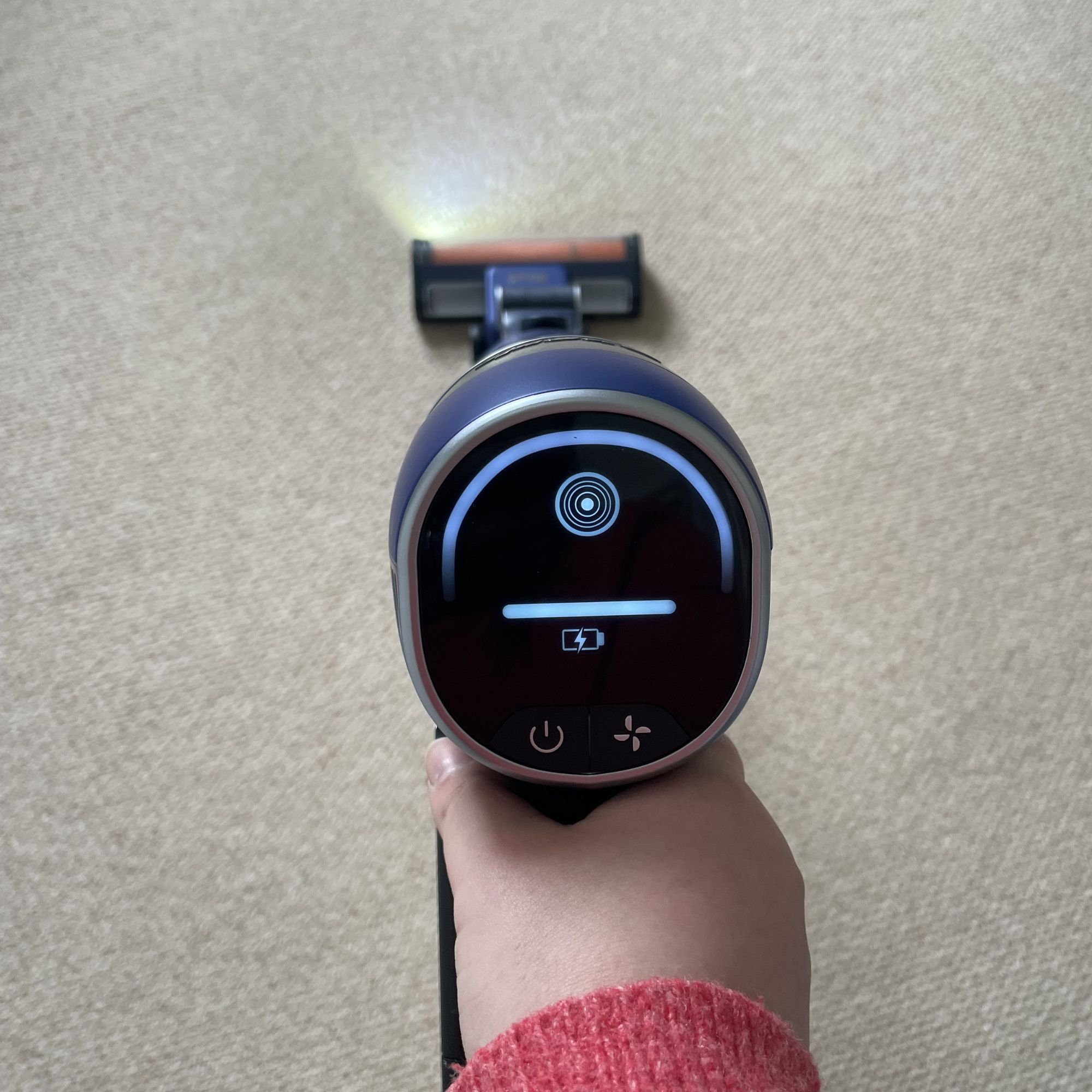 Using the Shark PowerDetect Speed Clean and Empty Pet Pro to clean cream carpet