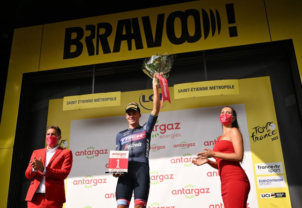 TrekSegafredo teams Danish rider Mads Pedersen celebrates on the podium with the most competitive rider prize after winning the 13th stage of the 109th edition of the Tour de France cycling race 1926 km between Le Bourg dOisans in The French Alps and SaintEtienne in central France on July 15 2022 Photo by Marco BERTORELLO AFP Photo by MARCO BERTORELLOAFP via Getty Images