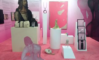 Pink room with various artwork