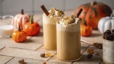 Autumn pumpkin spice latte with whipped cream and cinnamon
