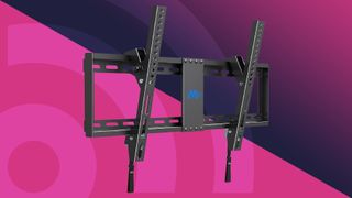 The Mounting Dream tilting TV wall mount against a pink background