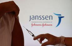 A vaccine in front of a Janssen/Johnson&Johnson logo.
